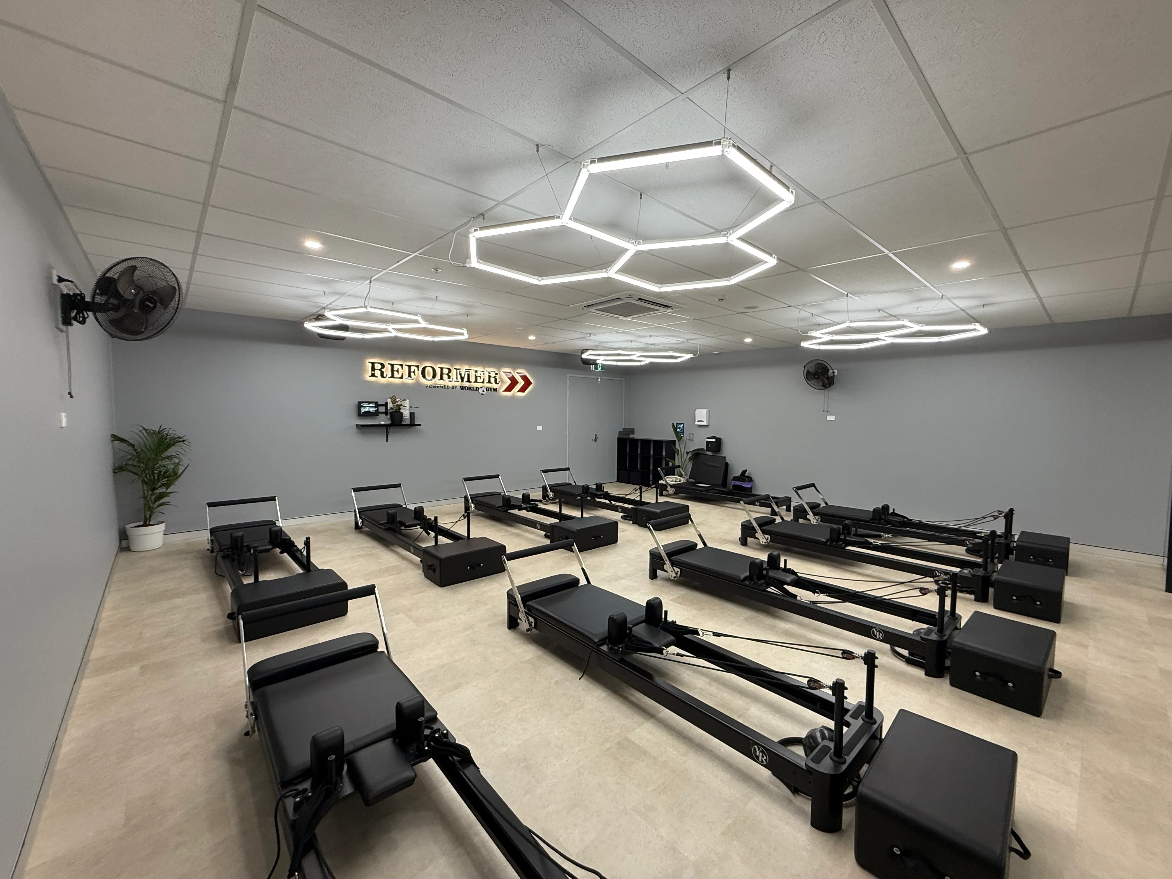 World Gym Coffs Harbour reformer studio fit-out — view 5 by Akers Construction