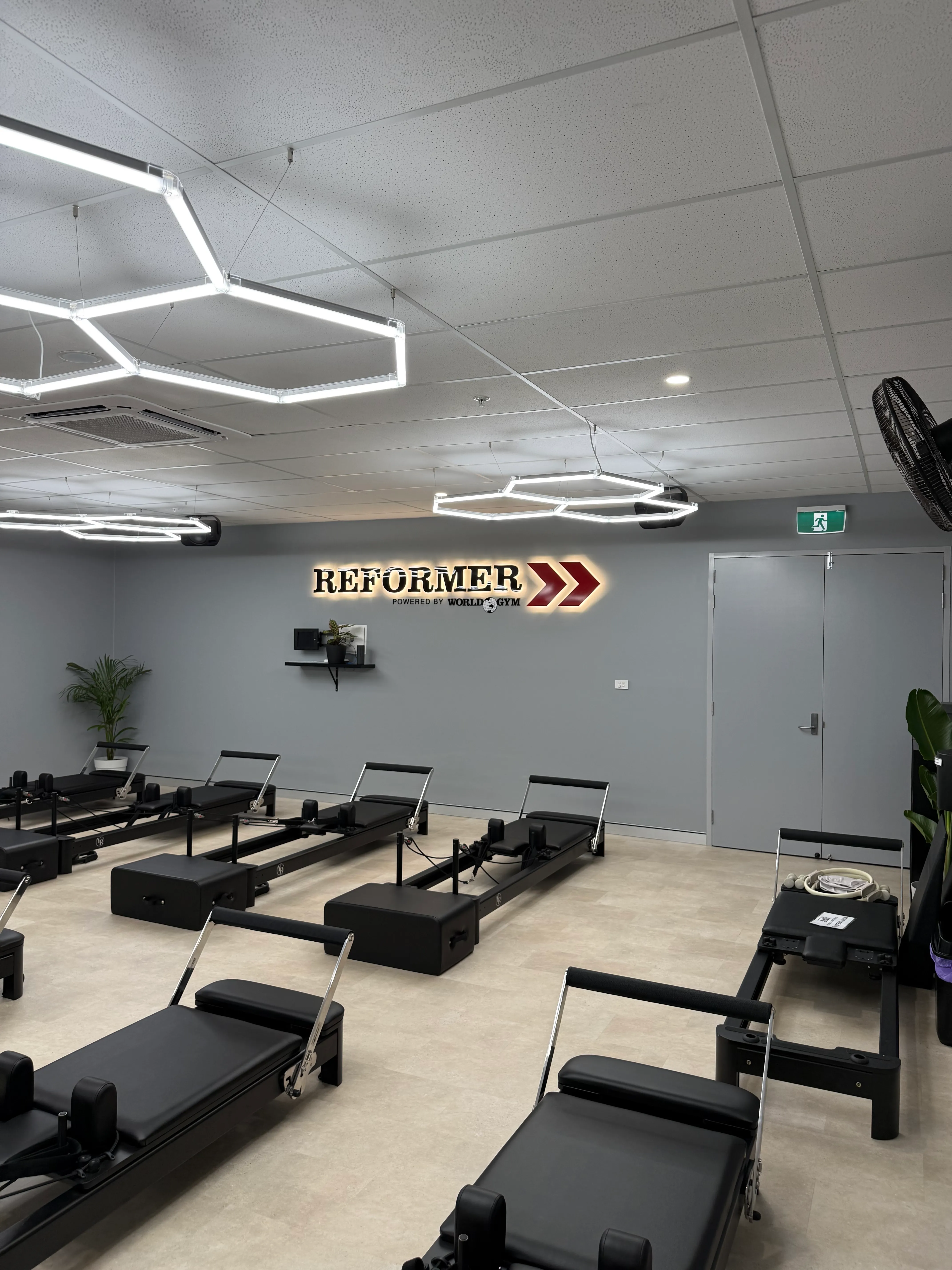 World Gym Coffs Harbour reformer studio fit-out — view 4 by Akers Construction